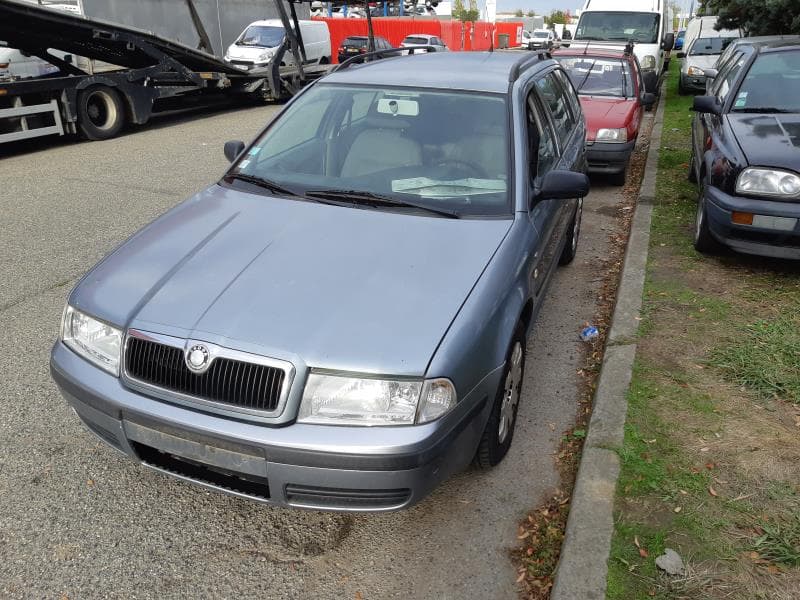 Optique avant principal gauche (feux)(phare) Skoda Octavia 1 · photo 1
