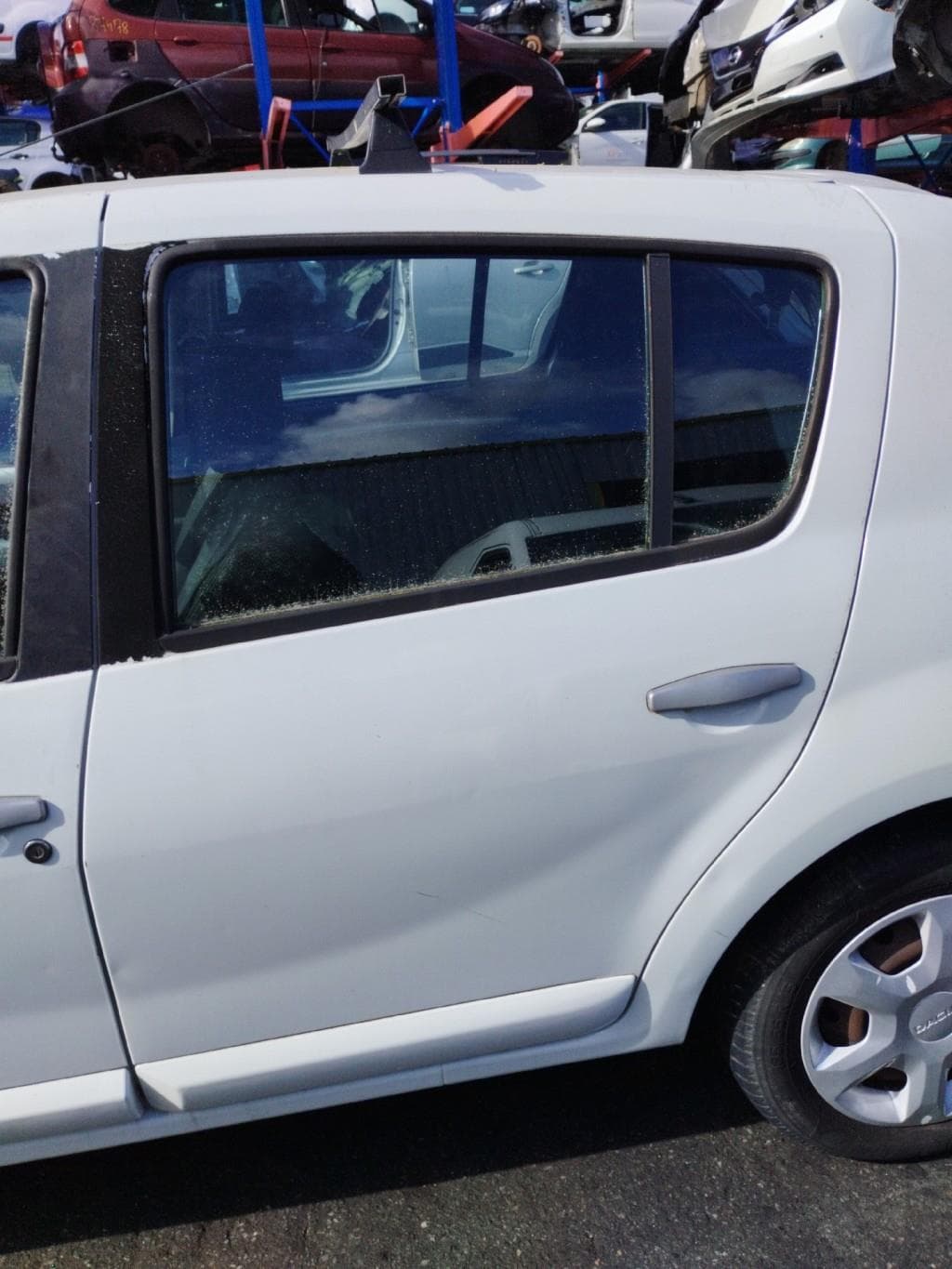 Porte arriere gauche Dacia Sandero 1 · photo 1
